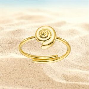 2. Adjustable “sea snail” ring gold