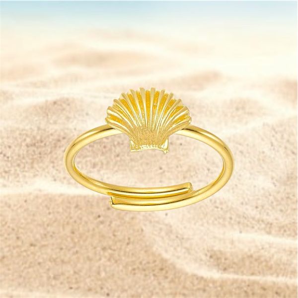 1. Anello regolabile “capesante di mare” oro BRASS Workshop dsd31