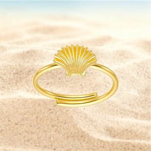 1. Anello regolabile “capesante di mare” oro
