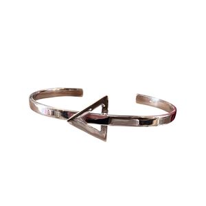 1. Rigid “triangle” bracelet silver gray
