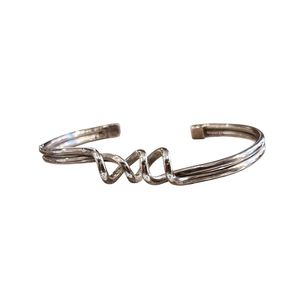 1. “Connection” rigid bracelet silver gray