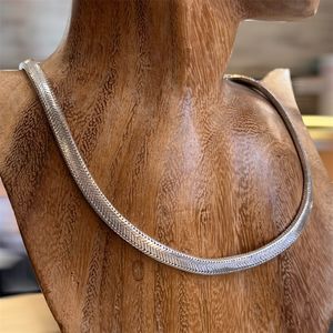 2. Snake choker necklace silver gray