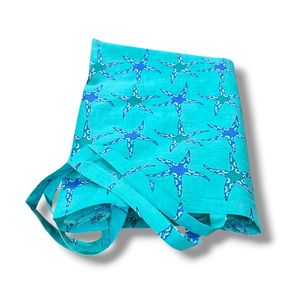 2. Pareo “stelle di mare” Verde acqua