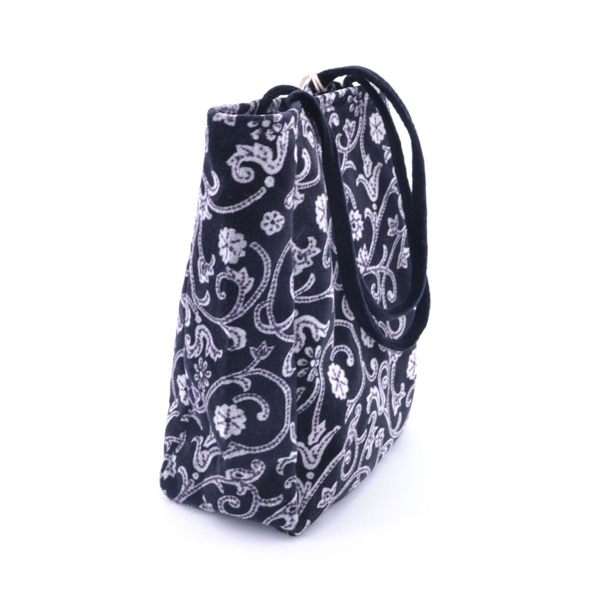 2. Patterned cotton, Semi-rigid bag in 100% Black BRASS Workshop novella