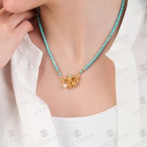 2. Collana girocollo turchesi e stelle marine turchese