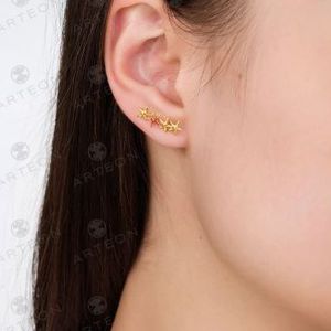 2. Orecchini "stelle marine" oro