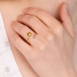 2. Anello contrarie "conchiglia rigata" oro