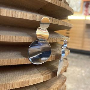 2. Orecchini tris di tondi grigio argento