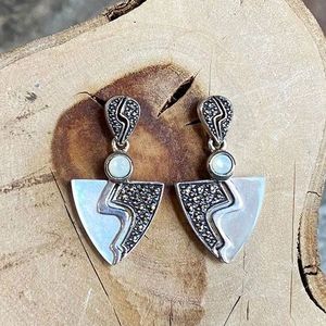 1. Marcasite and nacre drop earrings Silver gray