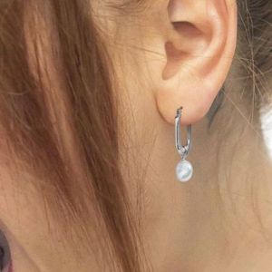 2. Orecchini ovale con perla grigio acciaio