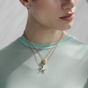 1. Collana catena con riccio di mare oro KALLIOPE Handmade Jewelry gk1089