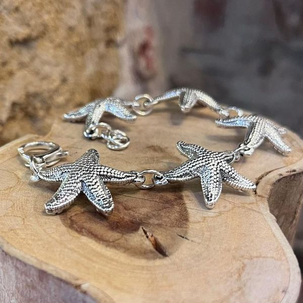 1. “Starfish” bracelet silver gray BRASS Workshop 25br08