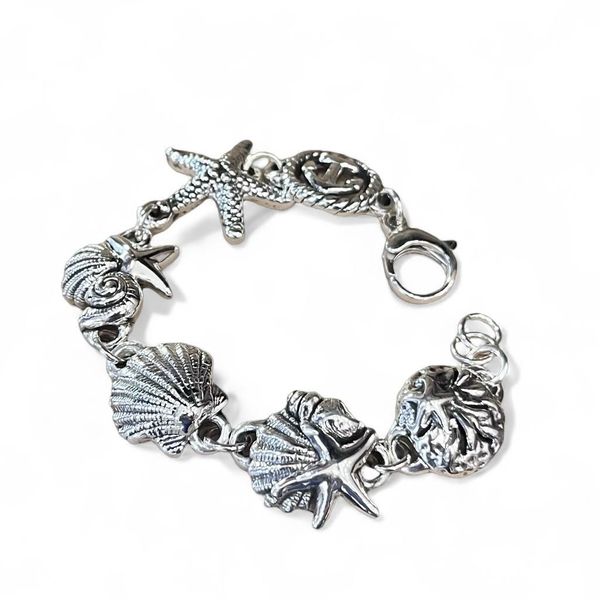 1. Starfish and shell bracelet silver gray BRASS Workshop 25br09