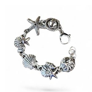 3. Starfish and shell bracelet silver gray BRASS Workshop 25br09