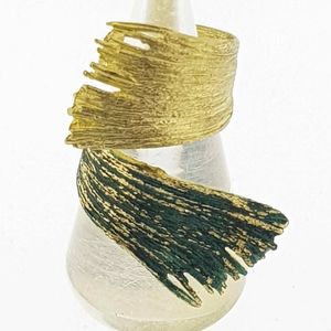 2. Anello Status oro